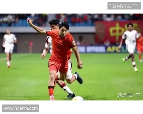 伊拉克足球队与国足激战正酣谁能在国际赛场上笑到最后